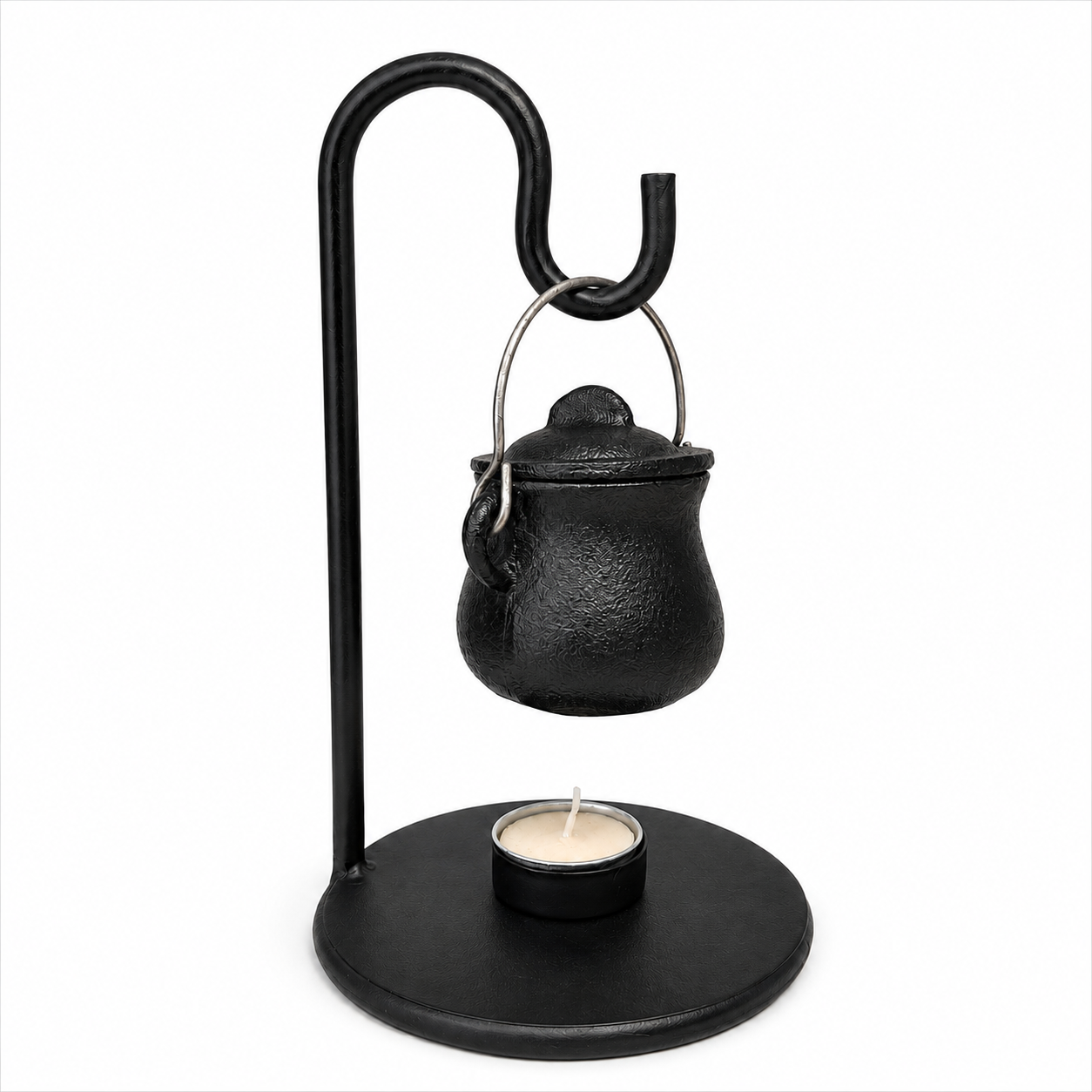 A black metal hanging candle holder with a curved stand, a small textured black cauldron suspended by a metal loop, and a tea light candle in a round black base on a white background.