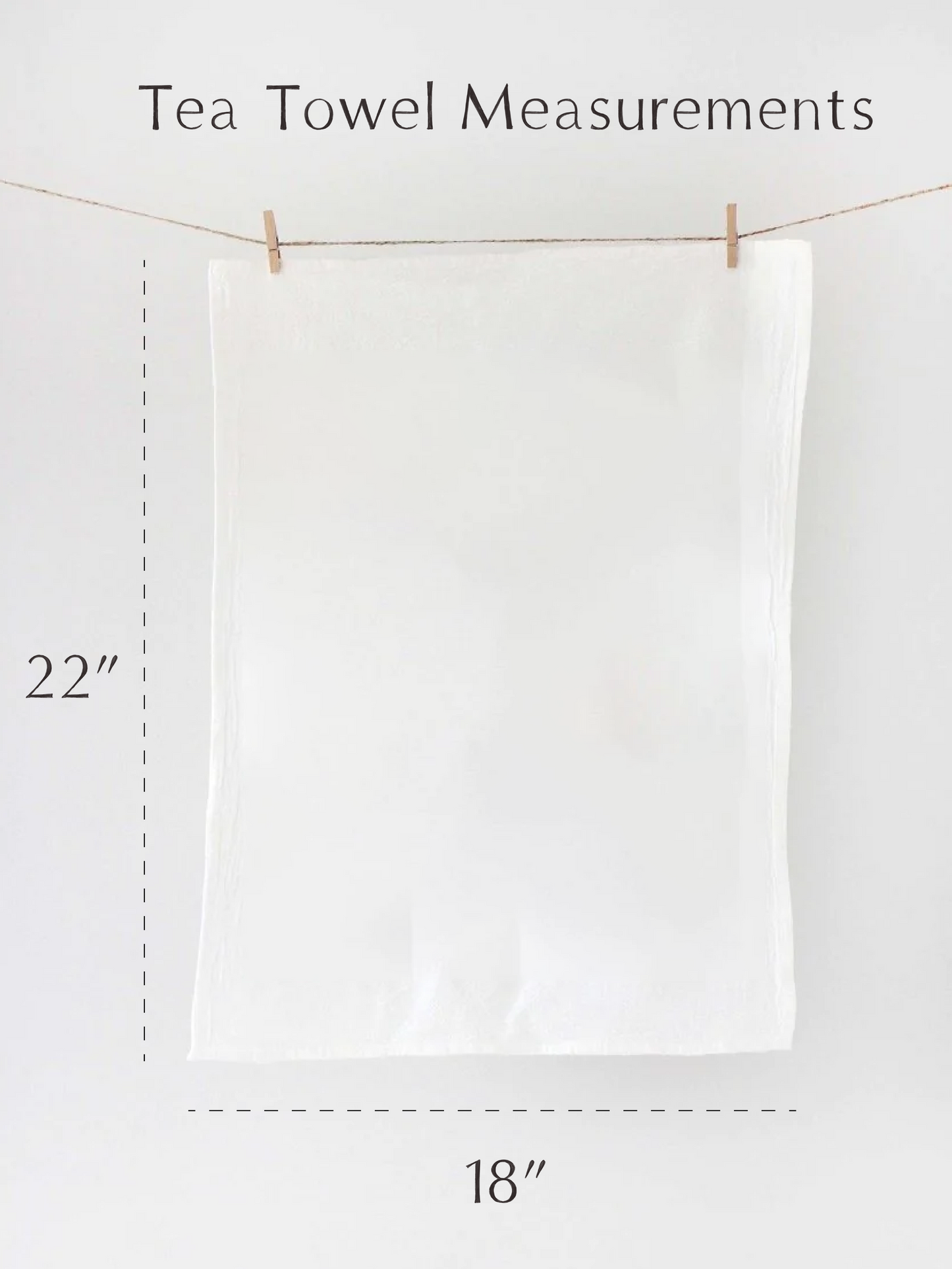 White tea towel hanging on a line with measurements indicated.