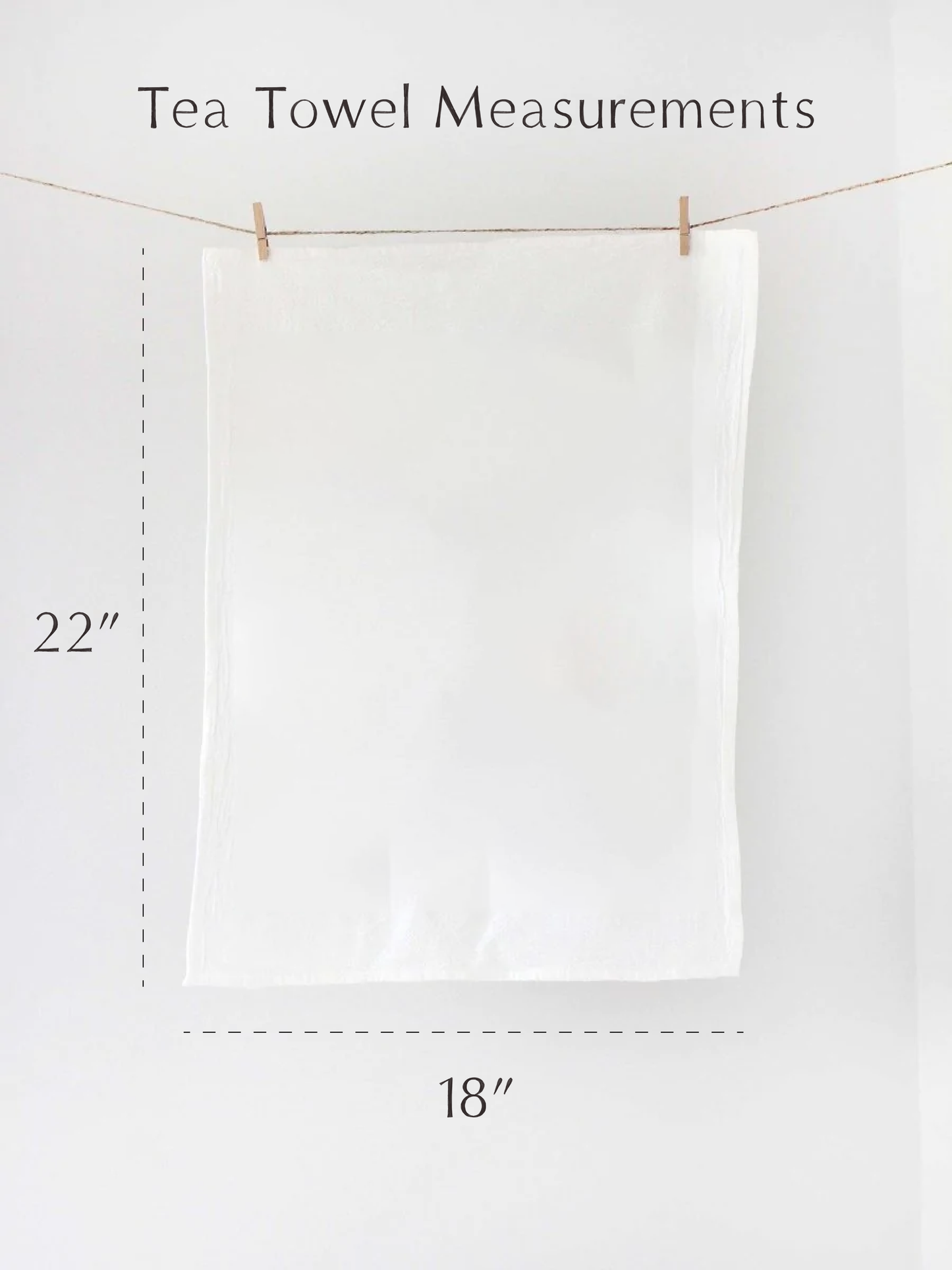 White tea towel hanging on a line with measurements indicated.