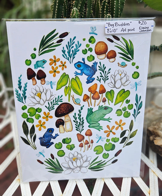Decorative paper with nature-themed design featuring frogs, plants, and flowers on a white background.