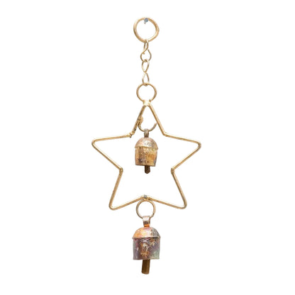 A gold-toned metal hanging ornament featuring a large star outline enclosing two small bell-shaped charms with iridescent, coppery-purple patina, suspended from a small ring on a white background.