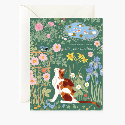 Greeting card with a dog and nature illustration on a green background