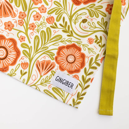 Floral-patterned fabric with a 'GINGIBER' label on a white background