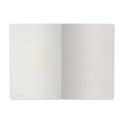 Open notebook with lined pages on a white background