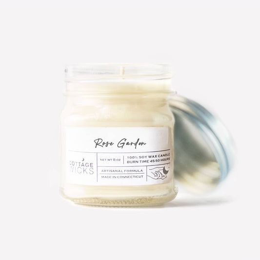 Candle jar with a label on a white background