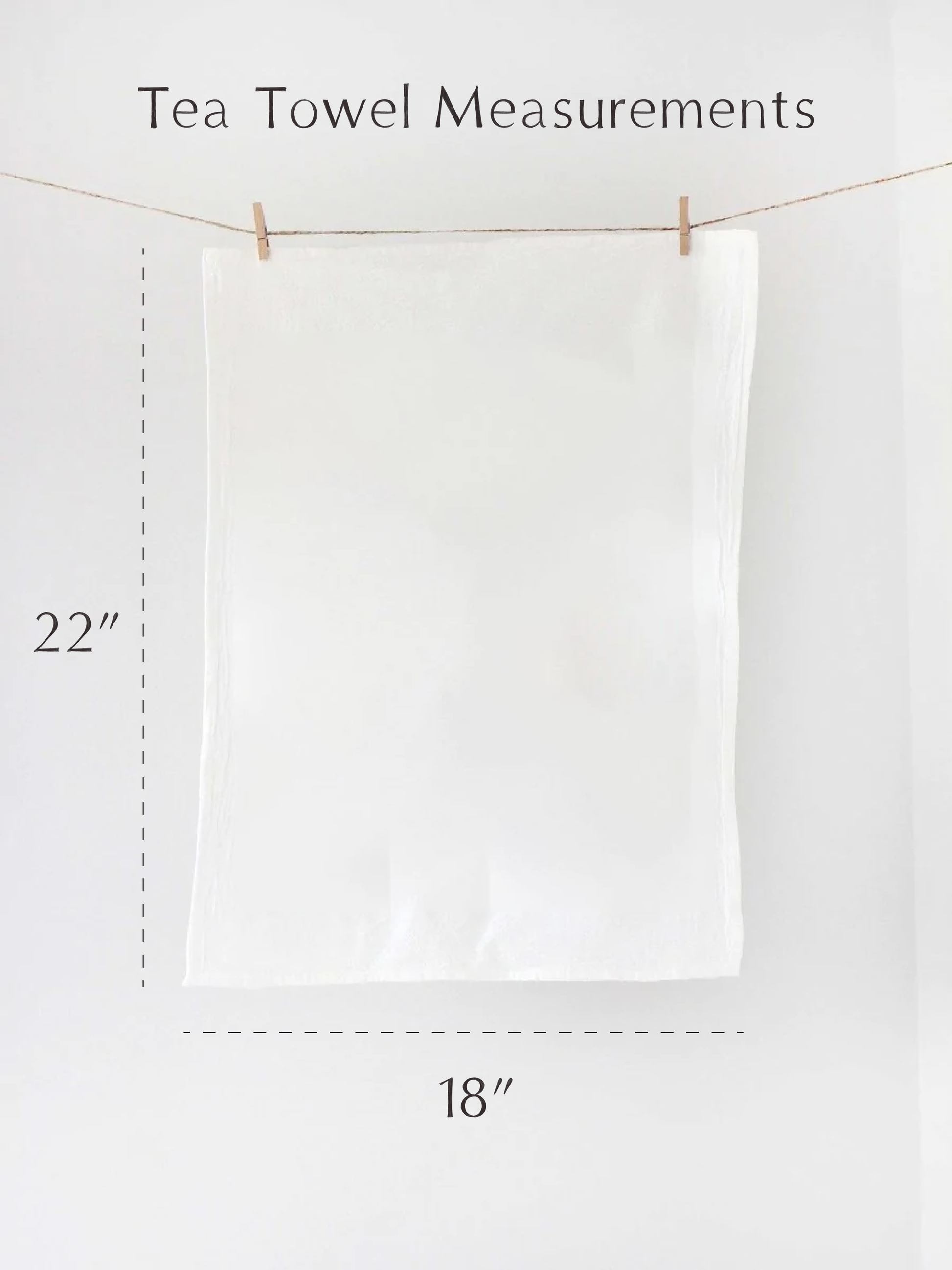 White tea towel hanging on a line with measurements indicated.