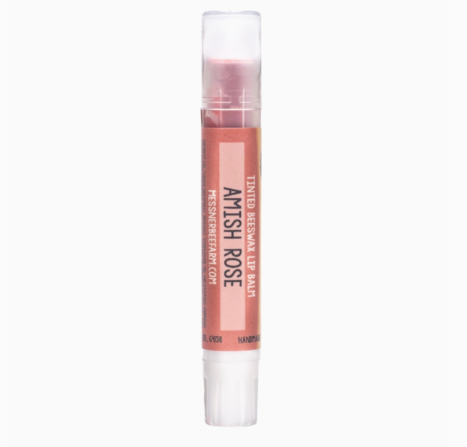 Lip balm with visible brand name on a white background