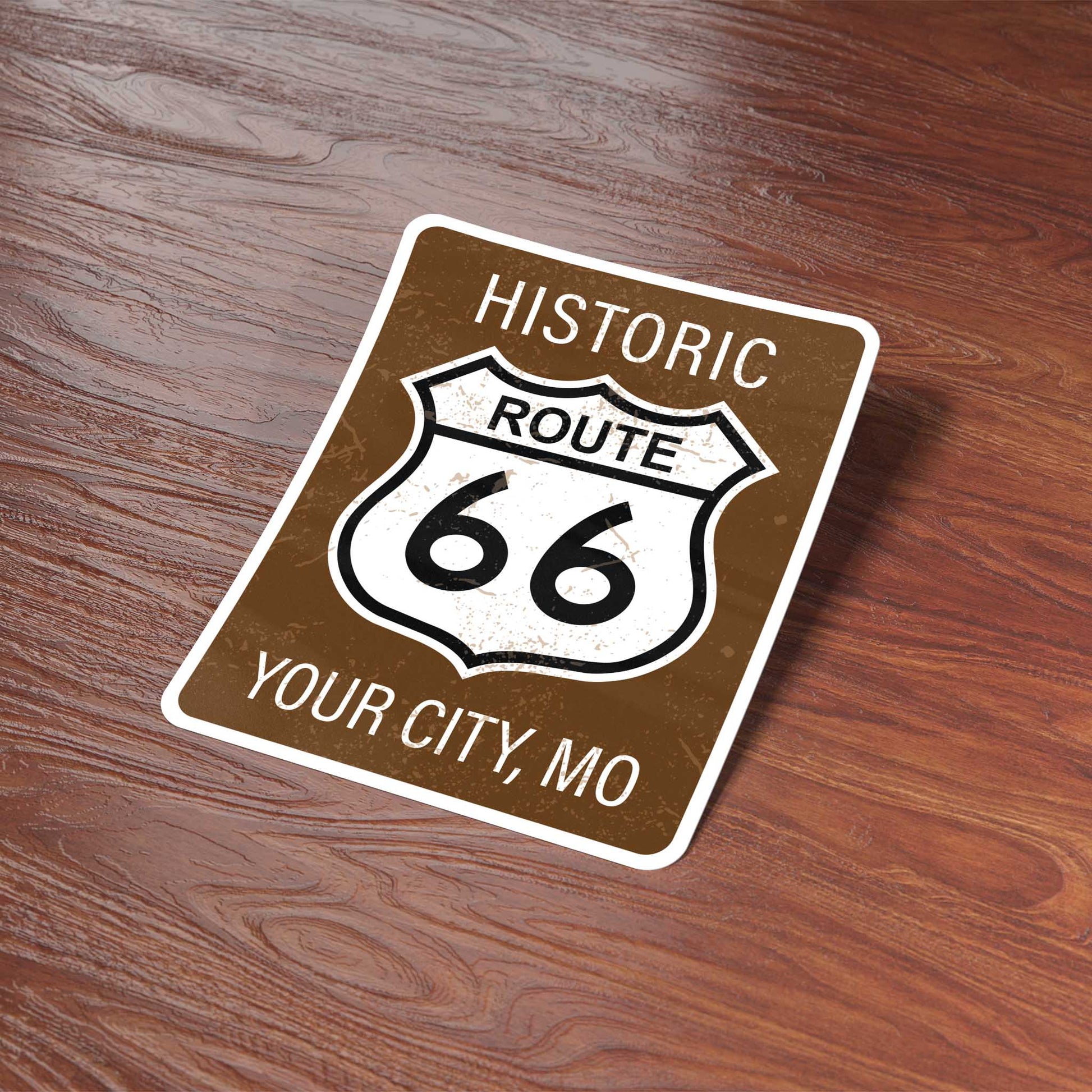 Sticker with 'Historic Route 66' design on a wooden surface