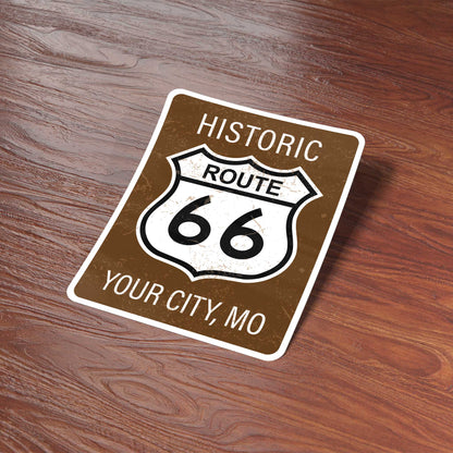 Sticker with 'Historic Route 66' design on a wooden surface