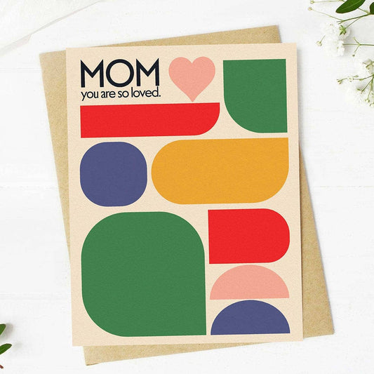 Greeting card with colorful geometric shapes and 'Mom you are so loved' text on a white background.