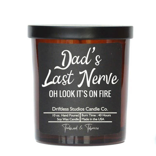 Candle with 'Dad's Last Nerve' label on a white background