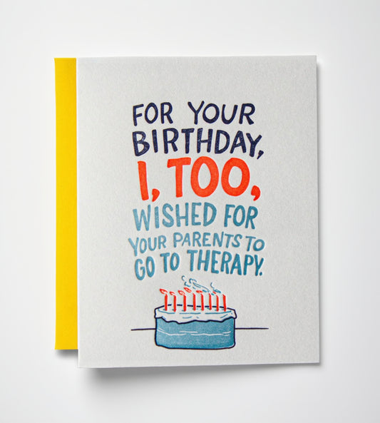 Birthday card with humorous text and cake illustration on a white background