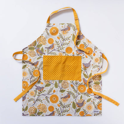 apron with floral and bird pattern on a white background