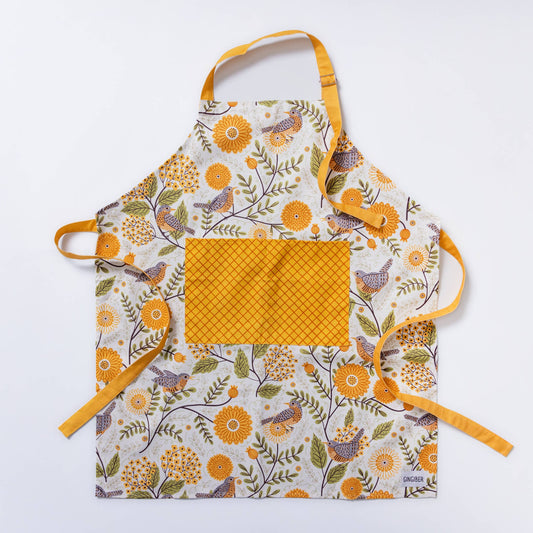 apron with floral and bird pattern on a white background
