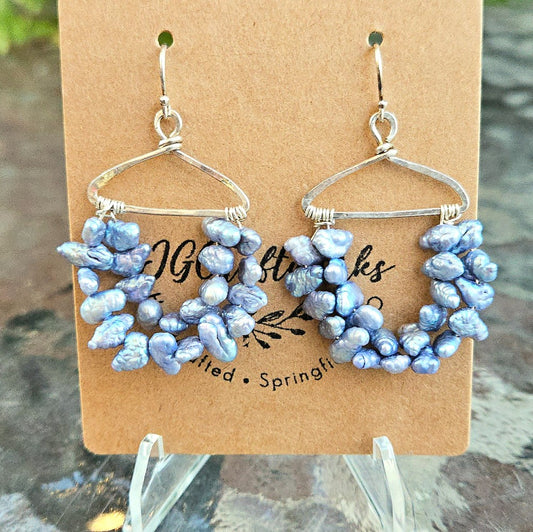 Sterling silver and natural pearl dangles|196