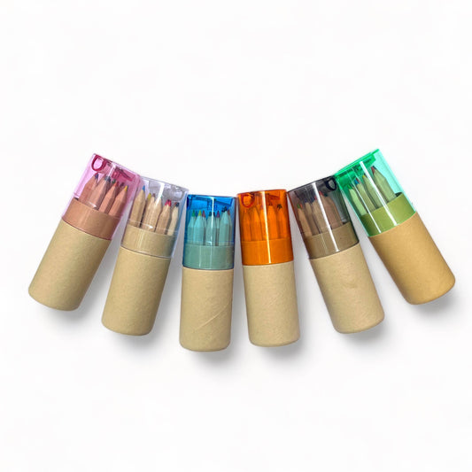 Set of six colorful markers with cardboard bodies on a white background