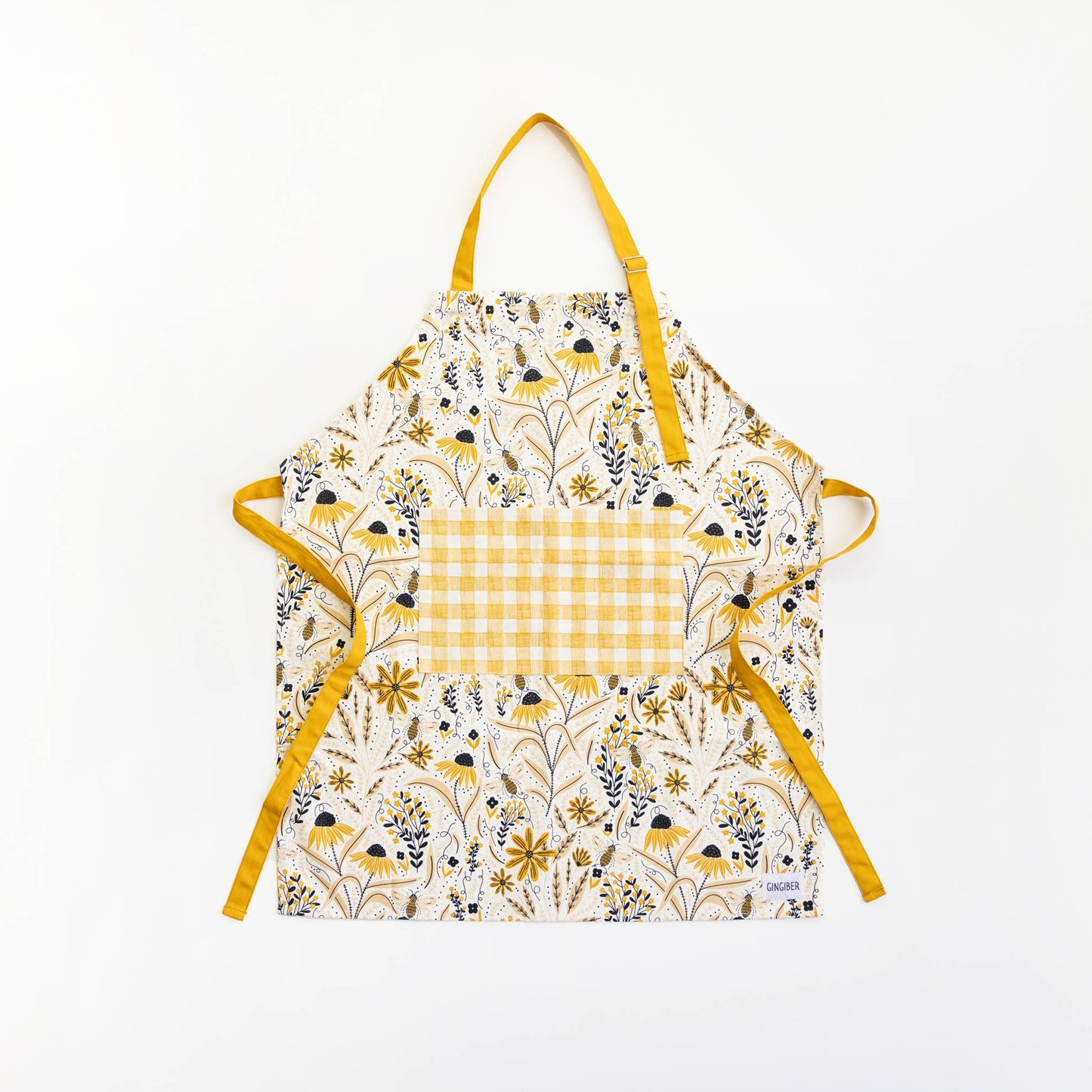 Floral apron with yellow accents on a white background