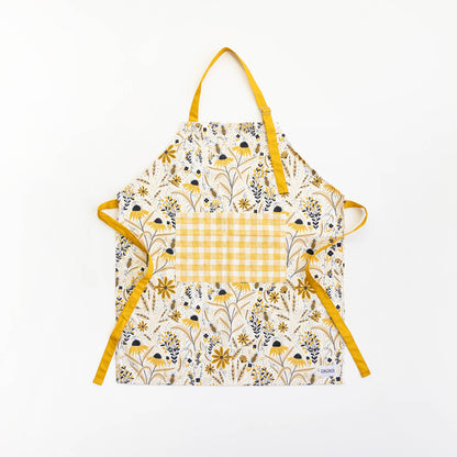 Floral apron with yellow accents on a white background