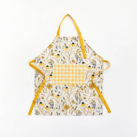 Floral apron with yellow accents on a white background