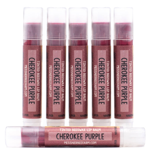 Set of five lip balm tubes labeled 'Cherokee Purple' on a white background.
