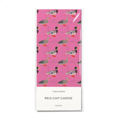 Tissue paper with duck pattern on a pink background, branded 'Red Cap Cards'.