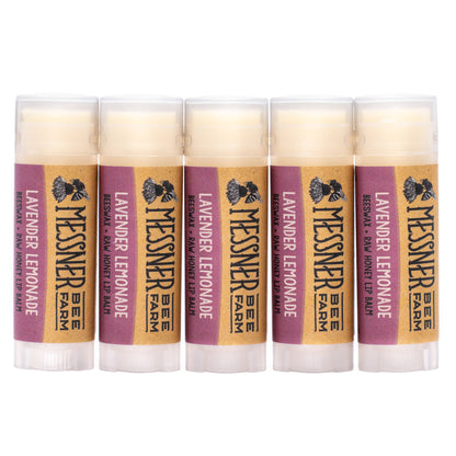 Five lip balm tubes from Messner Farm on a white background
