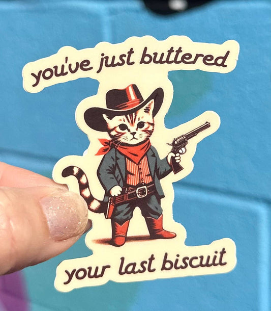 "Buttered Your Last Biscuit" Cowboy Cat Sticker