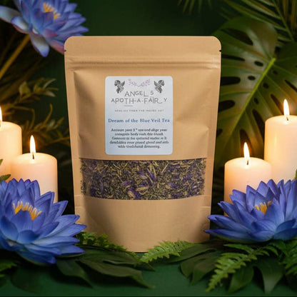 Tea packaging with candles and flowers on a dark green background