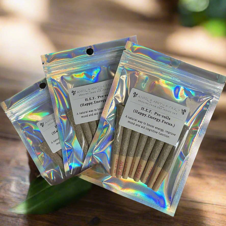 Holographic packages of pre-rolled joints on a wooden surface with a blurred background