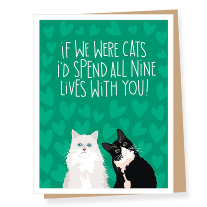 Greeting card with two cats and a romantic message on a green heart-patterned background