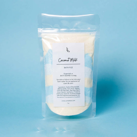 Packaged bath fizz on a light blue background
