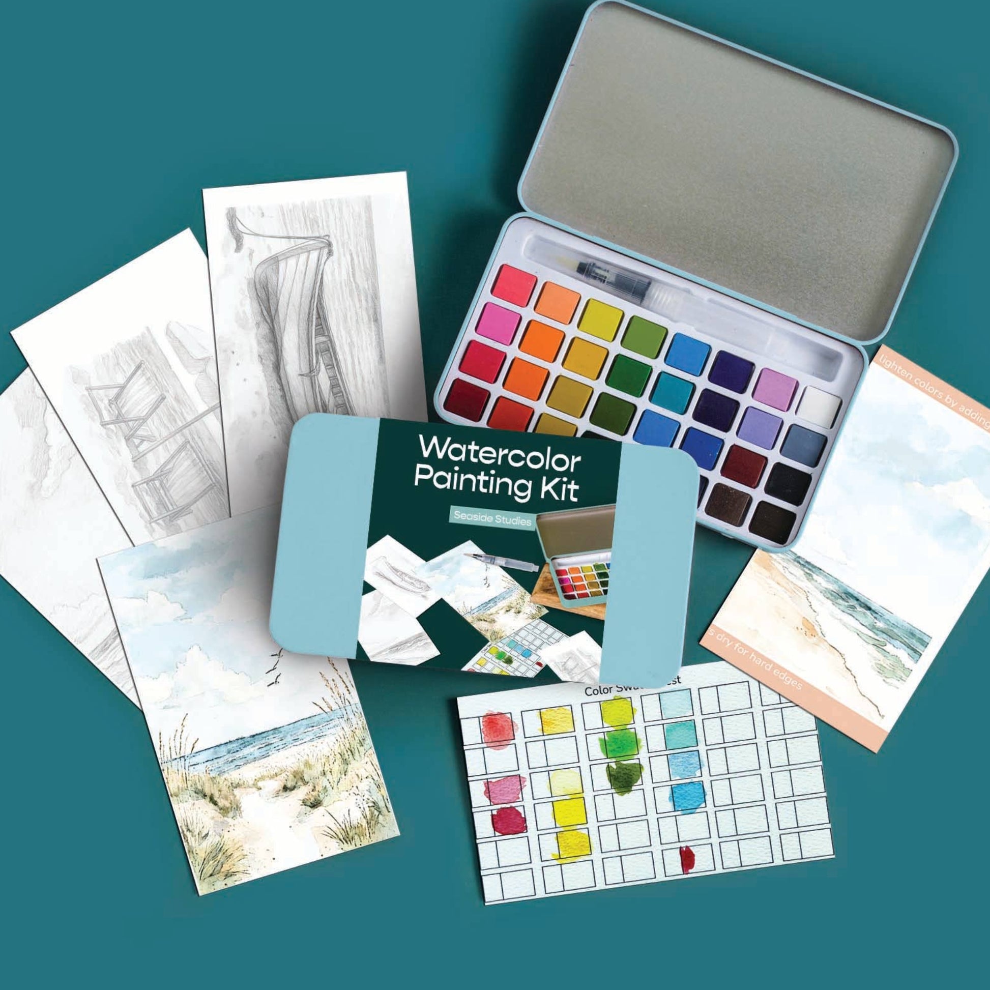 Watercolor painting kit with color swatches, samples, and instruction booklets on a teal background